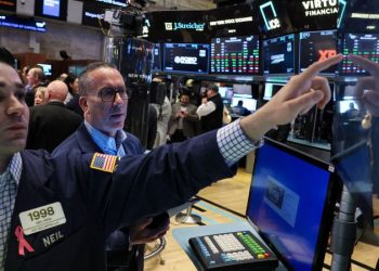 S&P 500 enters correction territory to close volatile trading week