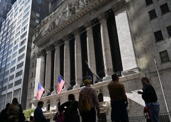 Dow closes up more than 510 points to kick off a busy week for the US economy