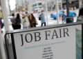 US weekly jobless claims fall; labor market still slowing