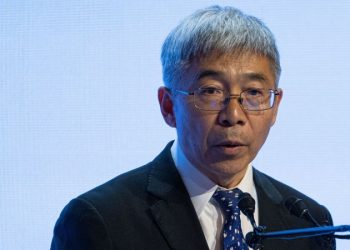 Chinese leaders defend state of economy at global finance summit in Hong Kong