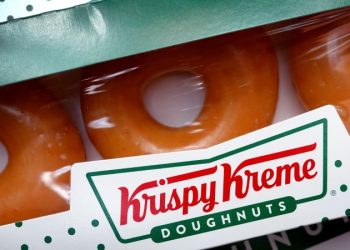 Krispy Kreme is giving away free boxes of donuts, but there’s a trick to getting them