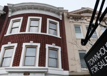 At their annual mega-party, real estate agents on edge over the potential erosion of their commissions