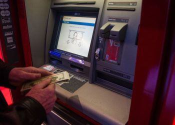 More Americans are yanking money from their 401(k) plans to pay the bills