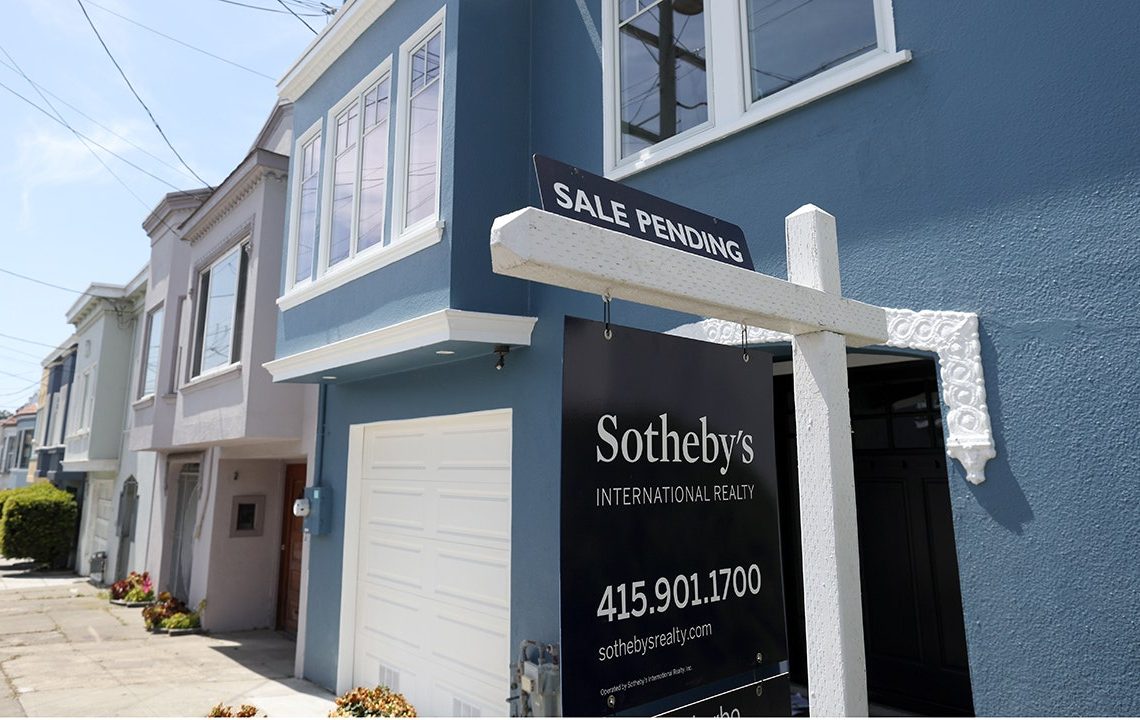 Mortgage rates edge lower, remain near 7%