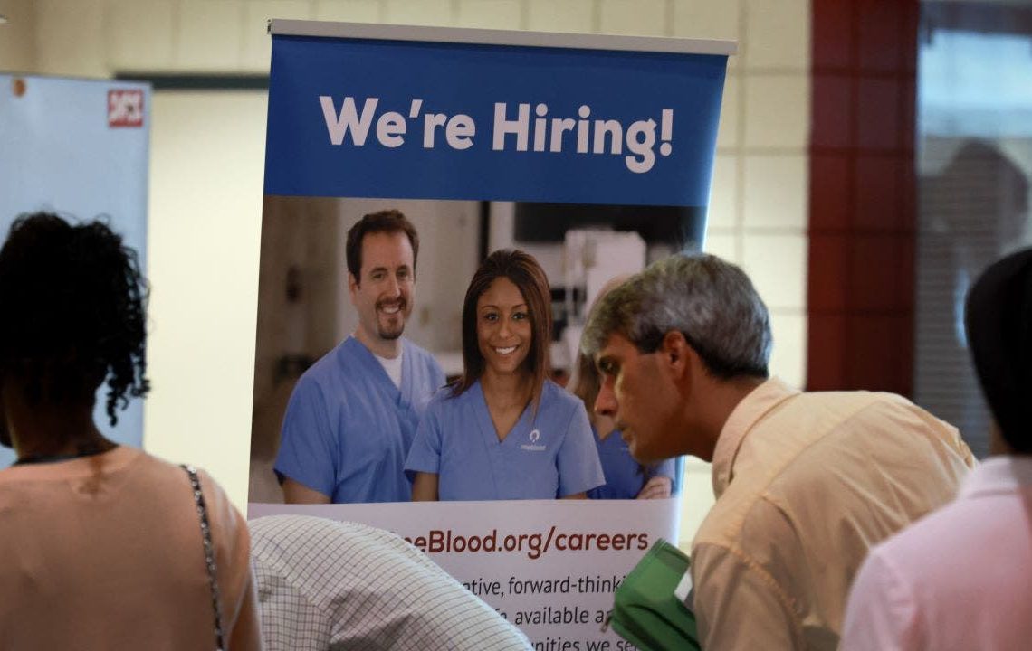 US economy added jobs at a faster pace in March