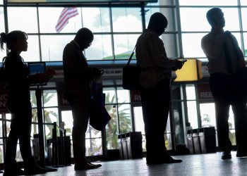 US weekly jobless claims rise more than expected as labor market eases
