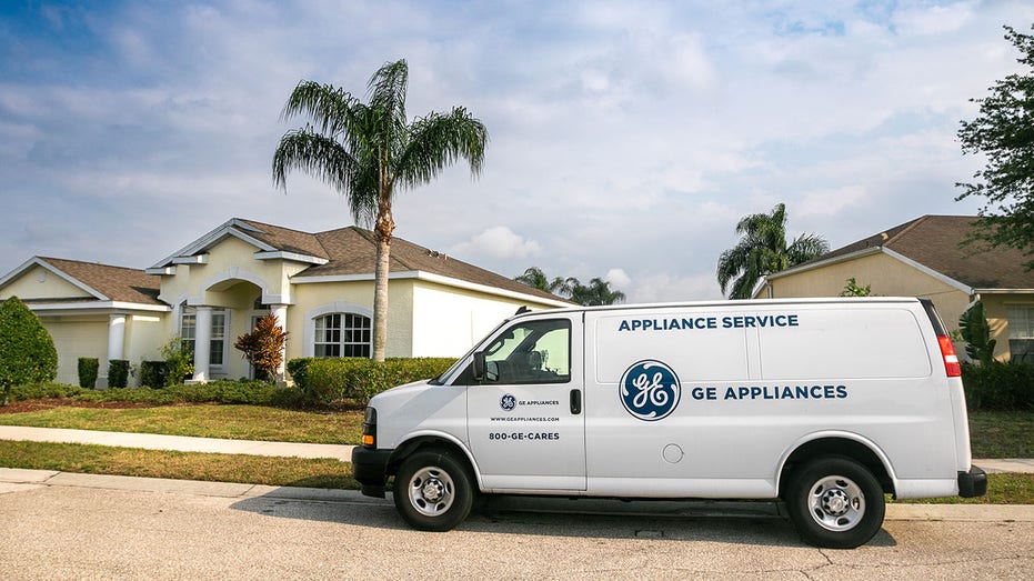 a GE Appliances van outside a home