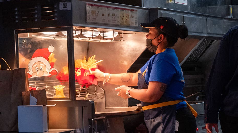 NEW YORK CITY - JANUARY 05: A woman works in a McDonalds in Manhattan on January 05, 2024 in New York City. As the American economy continues to outperform expectations, the December jobs report showed that employers added 216,000 positions for the month as the unemployment rate held at 3.7% (Photo by Spencer Platt/Getty Images)