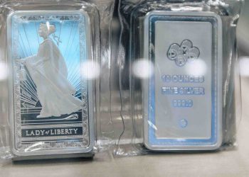 Silver surpasses $50 an ounce for first time amid geopolitical, economic uncertainty