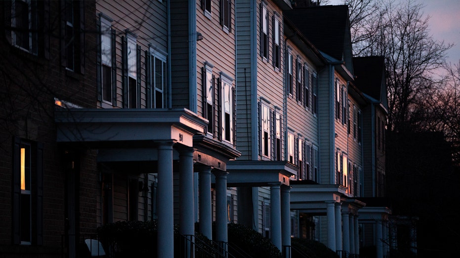 reflection of sunset reflected off row of homes in DC