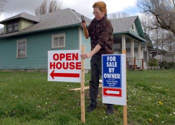 Mortgage rates edge lower, hover near 6%